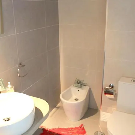 Дом отдыха Charming House In With Fireplace Назаре